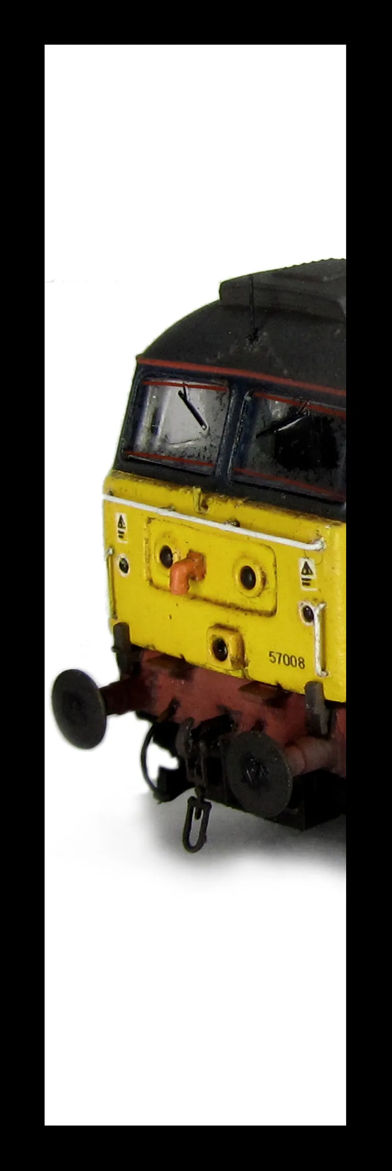 57008 with moulded roof grills replaced with etched fan and grills, renumbered, driver, moulded front handrails replaced with wire including pommels, body lowered, detailed battery box, pipe on nose, etched nameplates, detailed buffer beam at one end, sem