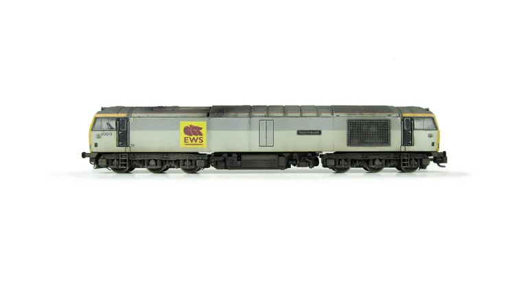 60013  Faded paintwork with special effect on one engine door showing a different shade of grey, grey light surrounds, different coloured nameplates, renumbered, detailed buffer beam at one end and semi detailed at coupling end, body lowered. Relivery wit