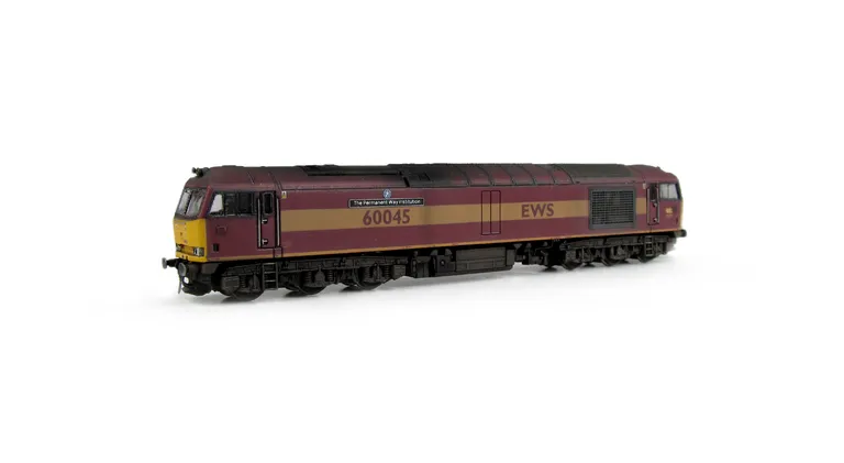60045  Faded paintwork with work plates on nose end and colour of headlight surrounds changed, etched nameplates, renumbered, detailed buffer beam at one end and semi detailed at coupling end, body lowered and driver fitted.