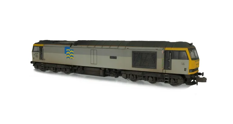 60064 with semi detailed detailed buffer beam at both ends, relivery to Metals sector and other livery modifications, snowploughs fitted with notch for couplers, renumbered, driver fitted, etched plates/arrows and body lowered.