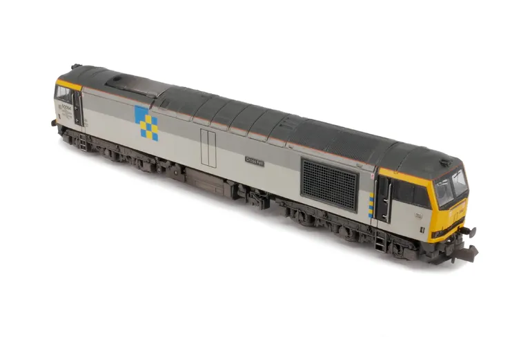 60084 Details include: renumbered, re livery to construction sector, semi detailed buffer beam at both ends including snowploughs fitted with notch for couplers, driver fitted, etched plates and body lowered.