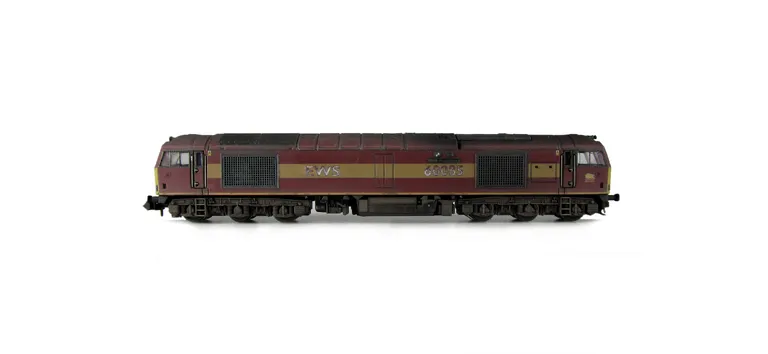 60085 with faded paintwork, detailed buffer beam at one end and semi detailed at coupling end, renumbered with white and faded numbers, etched plates, and body lowered.