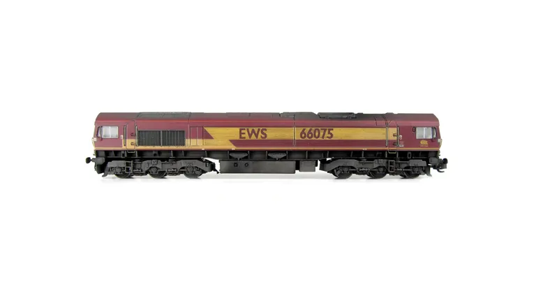 66075 with faded paintwork. Moulded front handrails replaced with wire versions including pommels, springs added to bogie frames, front lashing eyes removed and moved, moulded steps below doors replaced with wire versions, moulded roof grill replaced with