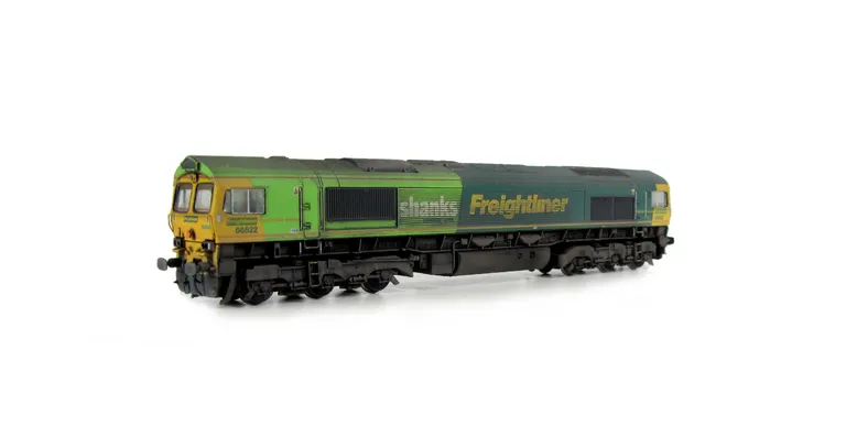 66522 with faded paintwork. Moulded front handrails replaced with wire versions including pommels, springs added to bogie frames, moulded steps below doors replaced with wire versions, moulded roof grill replaced with etched version including pipes under 