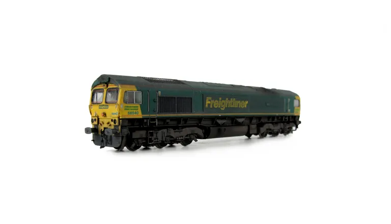 66540 with faded paintwork. Moulded front handrails replaced with wire versions including pommels, springs added to bogie frames, moulded steps below doors replaced with wire versions, moulded roof grill replaced with etched version including pipes under 