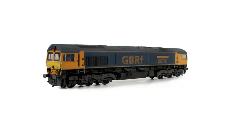 66701 with faded paintwork. Moulded front handrails replaced with wire versions including pommels, springs added to bogie frames, moulded steps below doors replaced with wire versions, moulded roof grill replaced with etched version including pipes under 
