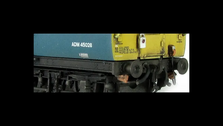 Inspection Saloon with detailed buffer beam at one end, faded paintwork, nose pipes painted and passengers added.