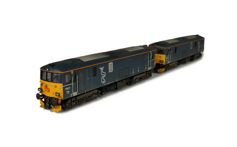 With full respray to Scotrail livery. Modified nose end, snowploughs, detailed buffer beam, renumbered and driver fitted.