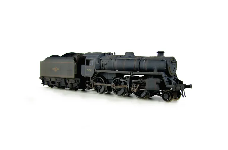 4MT 76084 heavily weathered with tender changed. Added details include: renumbered, molded coal replaced with real coal, loco crew added, fire irons, etched depot plaques and work plates, detailed buffer beam at one end and painted cab interior.