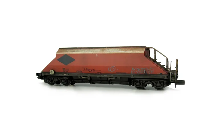 JGA Wagon with faded body, blanked out logo, load and grafitti added.