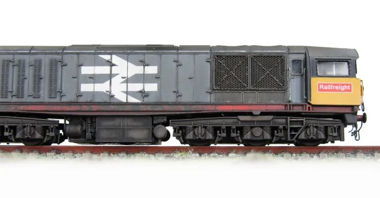 58029 Fitted with sound, livery errors corrected. Detailed buffer beam at one end. Nose end handrails and mu sockets replaced with finer versions and pommels added to nose rail. Special effect on lower body showing paint peeling. Body side handrails added