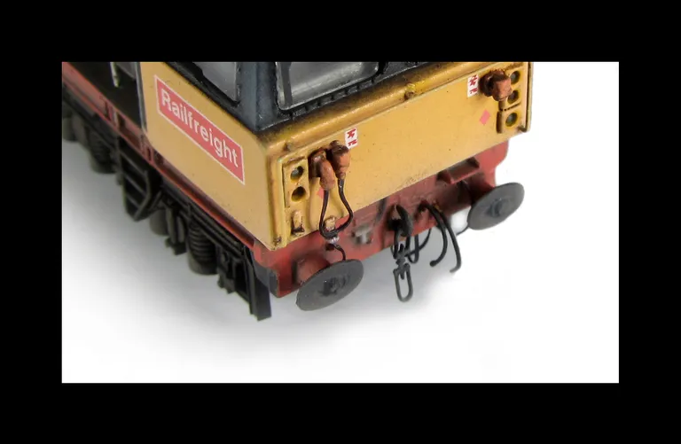 58027 with livery errors corrected, mu sockets and nose handrails replaced with finer versions, pommels added to nose handrails, side handrails, renumbered and detailed buffer beam at one end