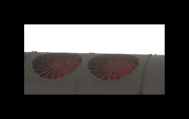 Close up of roof etched fan and grill.