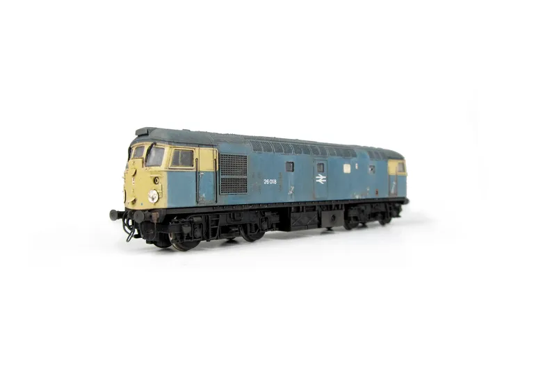 26018 Conversion to disc headcode version representing a loco in it's last days on the scrapline. Full respray into correct faded shades, renumbered, disc catches, special effect of paint peeling and rust patches, broken and boarded over windows, tapered 