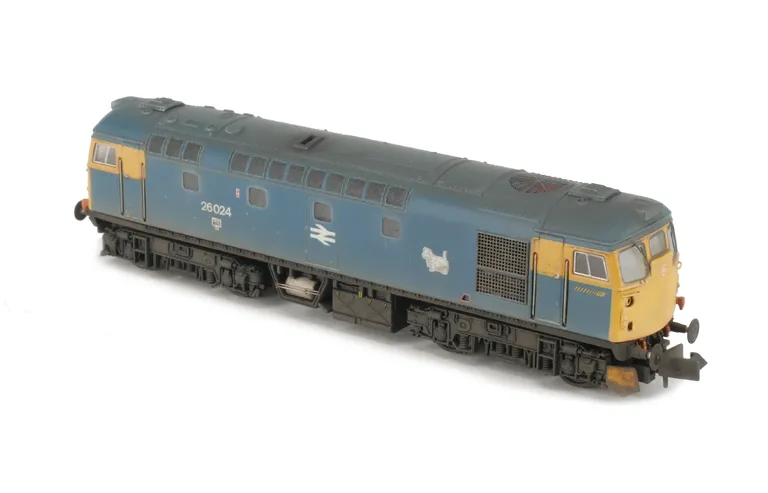 26024 Full respray to BR Blue, renumbered, brass buffers, snowploughs, front window surrounds thinned down, bodyside window frames taken off and made flush apart from one on either side, semi detailed buffer beam at both ends, moulded roof grills replaced