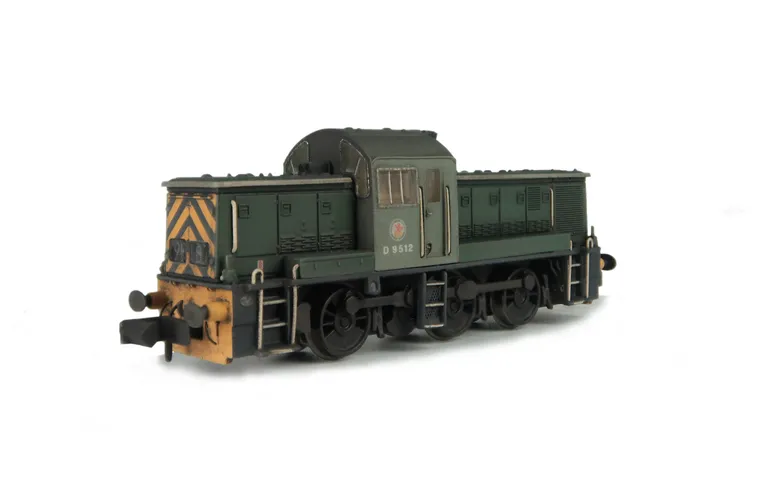 D9512 Renumbered with semi detailed buffer beams at both ends and buffer converted so that the cowling is in place. fuel gauge painted black as well as coupling rods, etched Swindon work plates and cab colour lightened to match prototype.