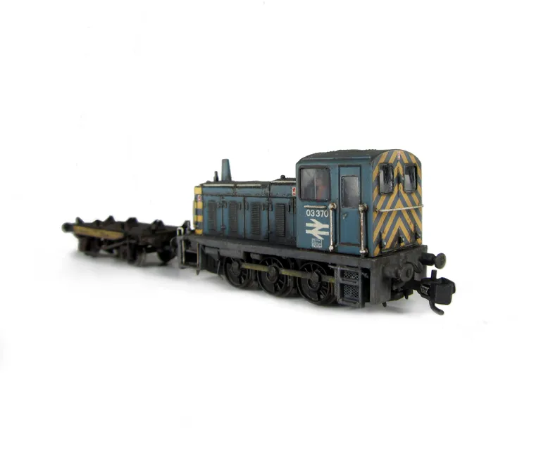 03370 Full respray into BR Blue livery with body modifications. Side steps taken off and made flush, renumbered, semi detailed buffer beam at both ends and driver fitted.
