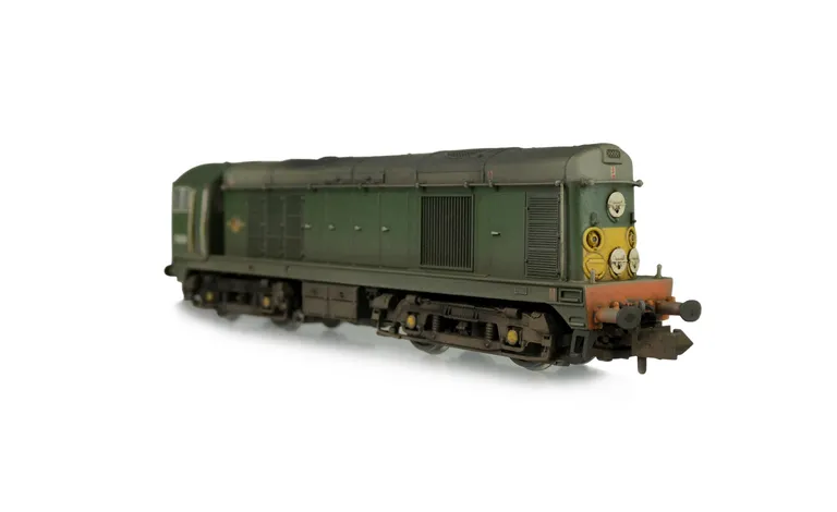 D8011 Details include: roof grills replaced with much finer etched fan and grill, headcode discs thinned down and holes filled, bogie modification to reduce the gap between body and bogies, semi detailed buffer beam at both ends, driver, etched workplates