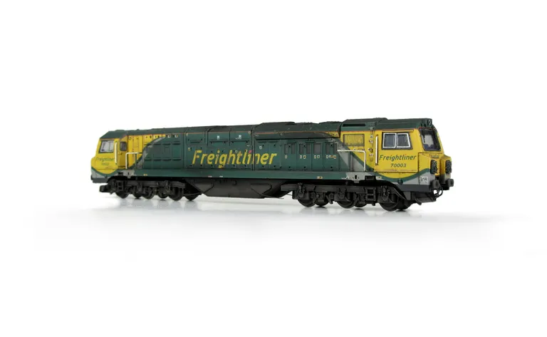 70003 with detailed buffer beam at one end and semi detailed at coupling end, snowploughs mounted on cab, driver fitted, long pipe added to underframe, short pipes to the sandboxes and a multitude of extra detail added to the top of the bogie frames and b