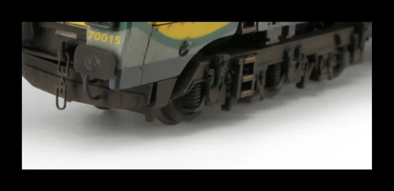 70015 with detailed buffer beam at one end and semi detailed at coupling end, snowploughs mounted on cab, driver fitted and a multitude of extra detail added to the top of the bogie frames and bottom of the running plate.