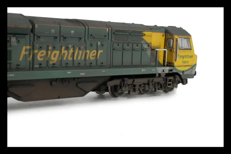 70015 with detailed buffer beam at one end and semi detailed at coupling end, snowploughs mounted on cab, driver fitted and a multitude of extra detail added to the top of the bogie frames and bottom of the running plate.