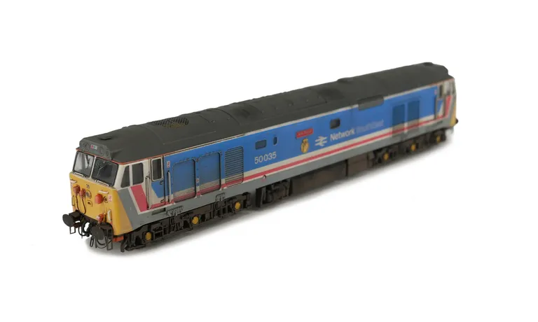 50035 With livery modifications of thicker white cantrail stripe with no middle orange, black front window surrounds and white extension to cab windows. Added details include: renumbered, etched nameplates, mu socket replaced, moulded roof grills replaced
