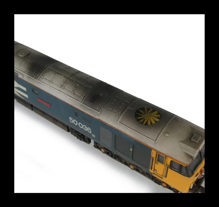 Close up of etched grills, resprayed roof to lighter shade and added cantrail.