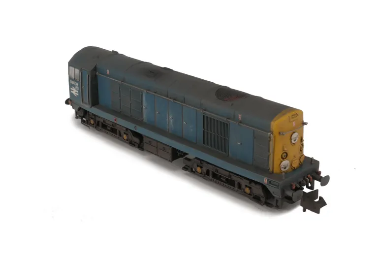 D8008 Renumbered with added livery variation. Details added: thinned down headcode discs with holes filled and resprayed,  roof grills replaced with much finer etched fan and grill, bogie modification to reduce the gap between body and bogies, speedo cable, finer ladder on one bogie, semi detailed buffer beam at both ends, horizontal radiator bar and buffers changed to oval versions.