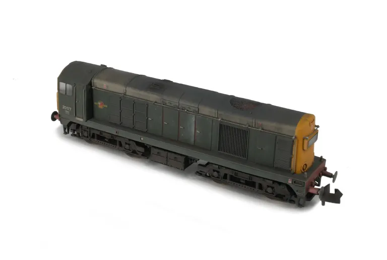 20177 Renumbered with ends resprayed to full yellow and faded distressed finish. Details added: renumbered, headcode changed, roof grills replaced with much finer etched fan and grill, bogie modification to reduce the gap between body and bogies, speedo cable, finer ladder on one bogie and semi detailed buffer beam at both ends. 